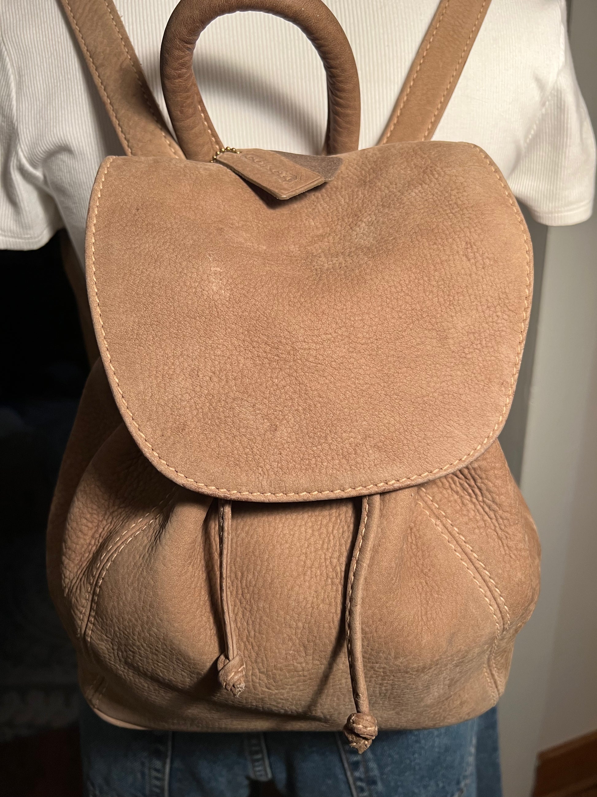 Coach leather drawstring best sale backpack